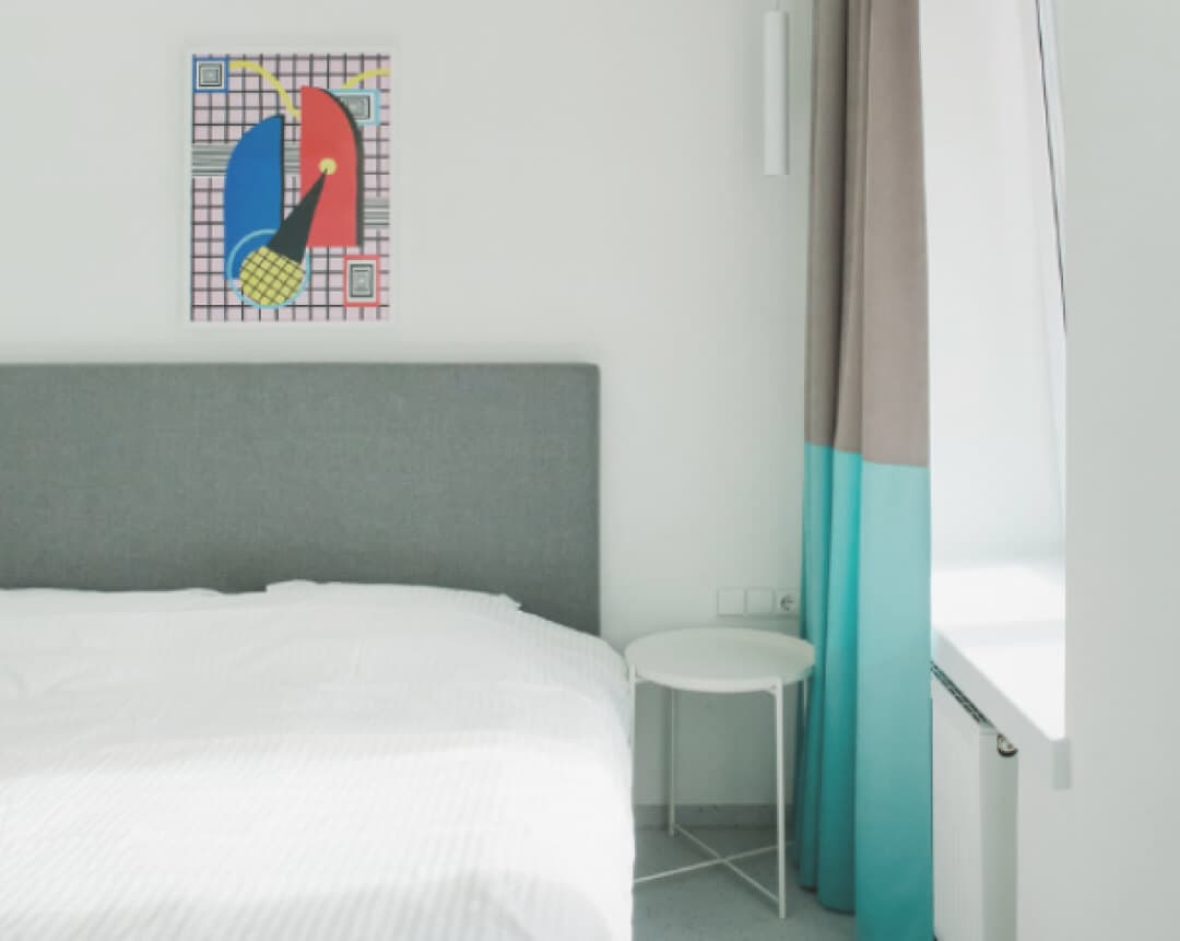 Bright, modern living space representing Happy Inn